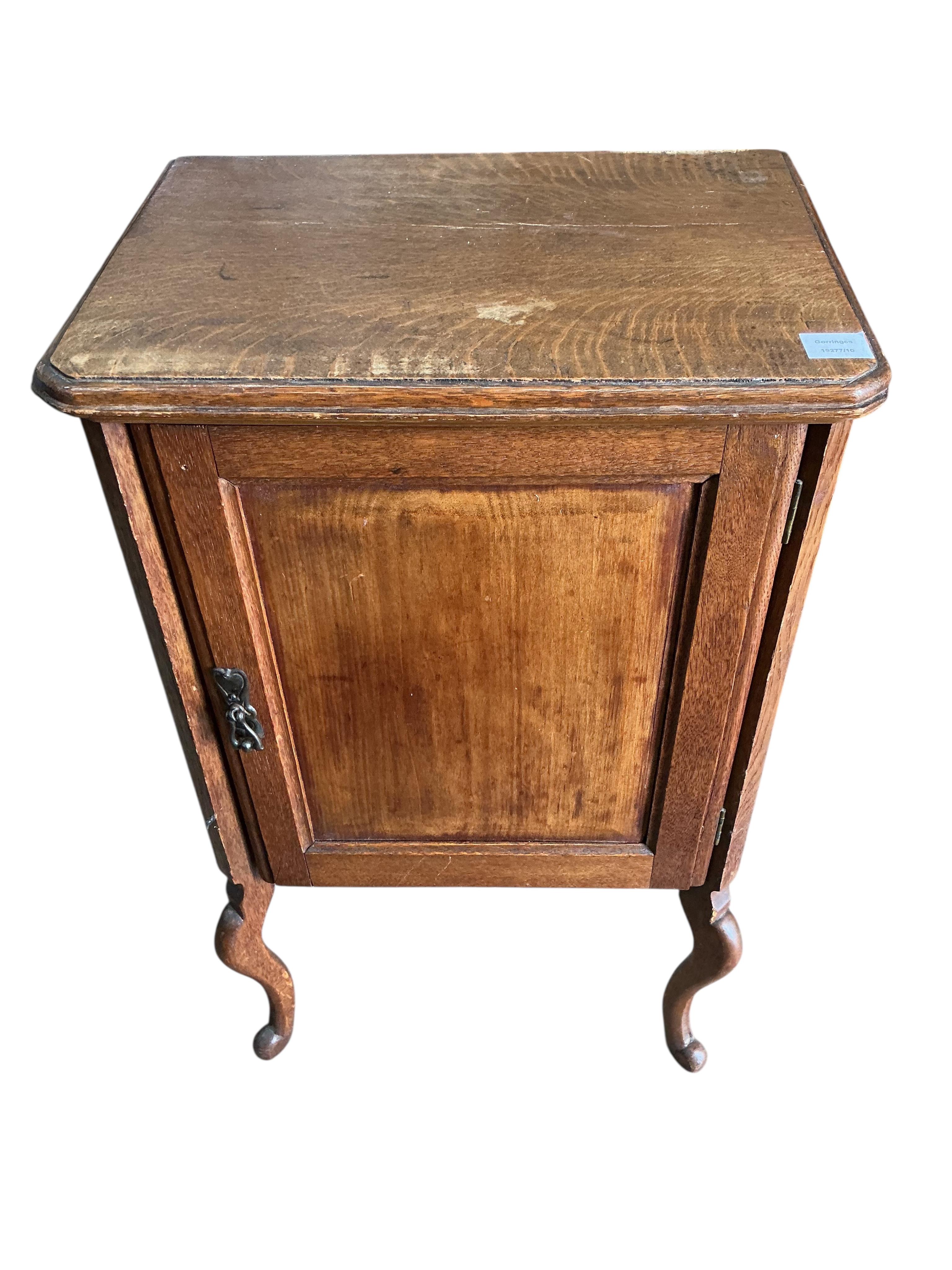 A 19th century French oak side cabinet, width 54cm, depth 38cm, height 94cm